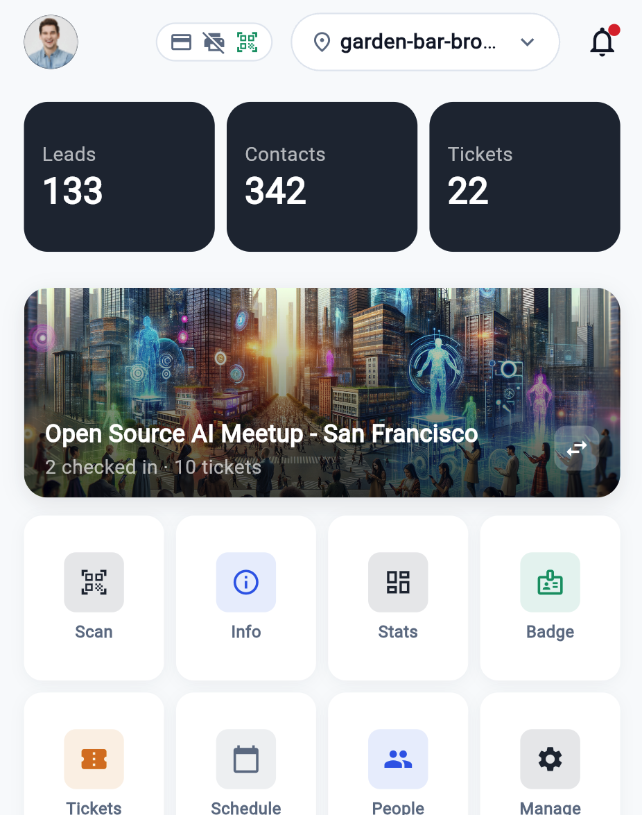 Home in event mode — the event card with live checked-in count and the Scan / Info / Stats / Badge / Tickets / Schedule / People / Manage tiles.